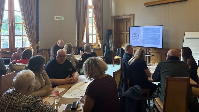 This image shows a meeting of the Customer Scrutiny Group