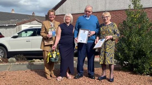 Maureen and George Hutchinson  with Provost Margaret Cooper and Deputy Lieutenant for Lanarkshire Linda McDowall