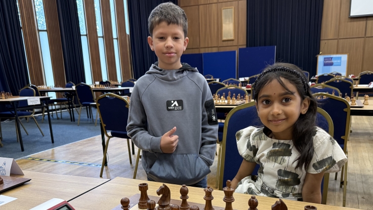 Vladyslav Shopynskyi (8) and the event’s youngest player, six-year-old Aaradhana Raghavendran at the Scottish Chess Championships, 2026.