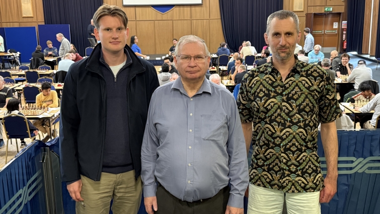 President of Chess Scotland Alex McFarlane (centre) with Johan-Sebastian Christiansen (left) and Andrew Greet at the Scottish Chess Championships, 2026,